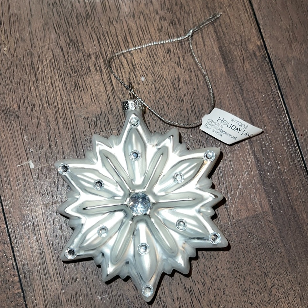 Holiday Lane glass snowflake ornament created for Macy’s